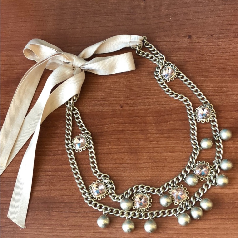 Statement necklace with ribbon tie